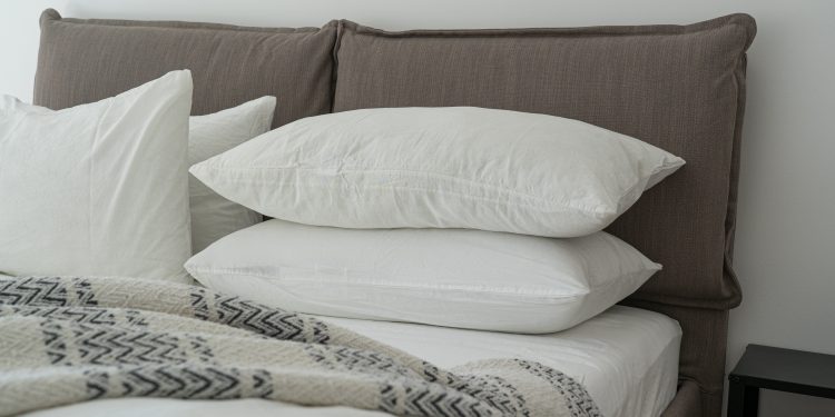 white pillows on a bed