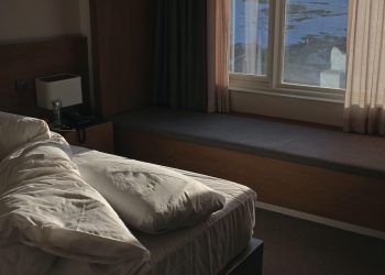 Bed in a room in the morning